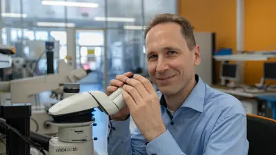 Sebastian Strrache using a stereo microscope
