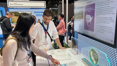 Vistors in conversation at SiC Display